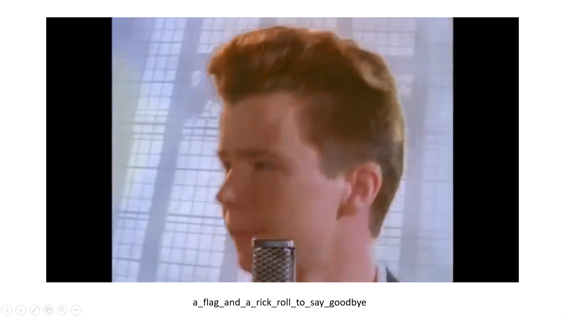 PowerPoint slide with Rick Astley's Never Going to Give You Up and the flag